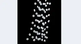 a group of white circles from a string