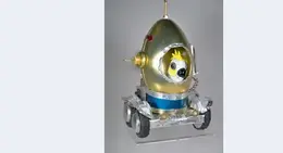 a toy robot with a parrot in the front