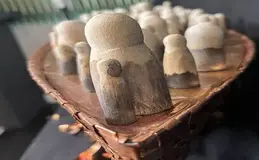a wooden figures on a boat